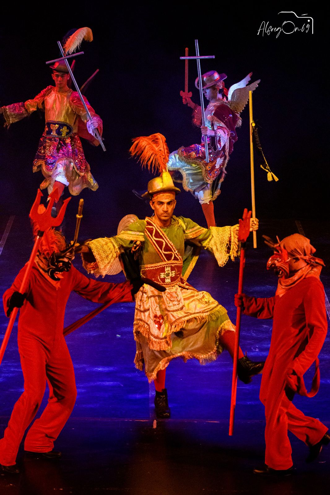 Dancers in elegant white dresses.