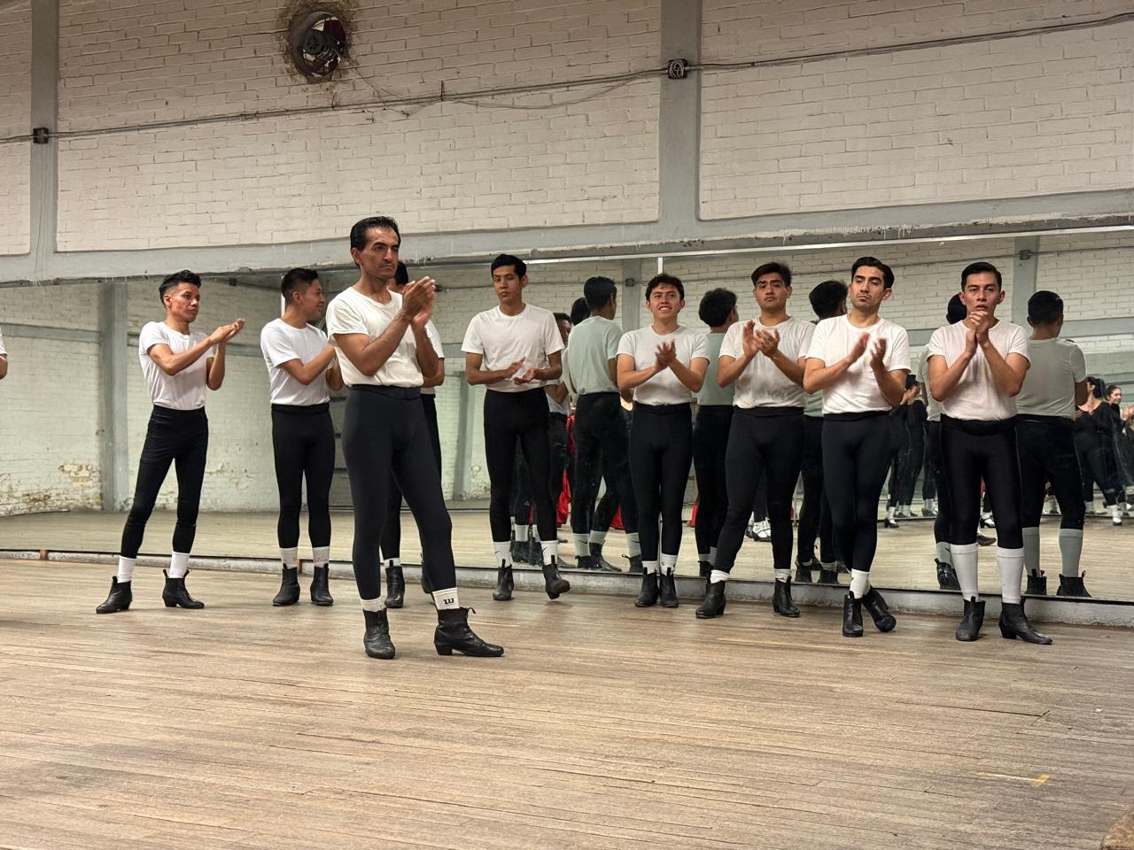 Full-width gallery image of musicians.